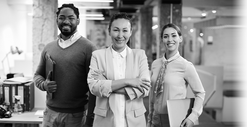 This is an image of three people. They're all smiling. It's an image on our Client Referral webpage. It indicates how happy current clients are and how willing they are to refer PrestigePEO to their friends and families.
